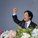 Taiwanese President Lai Ching-te cheers during National Day celebrations in front of the Presidential Building in Taipei, Taiwan, Saturday, Oct. 10, 2026. (AP Photo/Chiang Ying-ying)