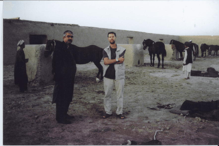 Williams with General Dostum in his compound’s stables in Sheberghan, northern Afghanistan.