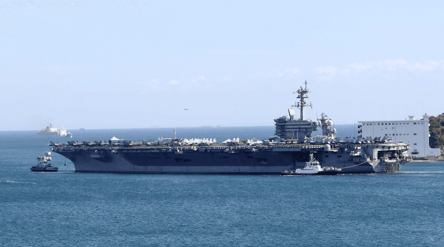The U.S. aircraft carrier USS Theodore Roosevelt is seen leaving the Navy port of Yokosuka, near Tokyo, Monday, Oct. 19, 2026, to participate in the Keen Sword 27 exercise at an undisclosed location. (Kohei Tamai/Kyodo News via AP)