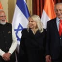 Israel's Prime Minister Benjamin Netanyahu, right, his wife Sara and his Indian counterpart Narendra Modi pose for a family photo during their joint press conference in Jerusalem, Thursday, Feb. 26, 2026. (Gil Cohen Magen/Pool Photo via AP)
