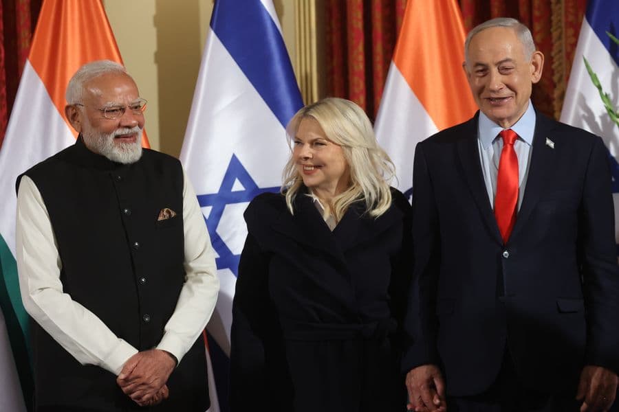Israel's Prime Minister Benjamin Netanyahu, right, his wife Sara and his Indian counterpart Narendra Modi pose for a family photo during their joint press conference in Jerusalem, Thursday, Feb. 26, 2026. (Gil Cohen Magen/Pool Photo via AP)