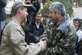 Dostum and Mark Nutsch warmly celebrating their friendship and victory as the campaign came to an end in a goodbye ceremony held by the Uzbek commander in his base at Khoda Barq.