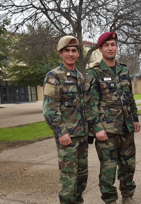 Nezam on left after proudly passing the grueling Q Course to become an elite Green Beret with his commanding officer Jamil.