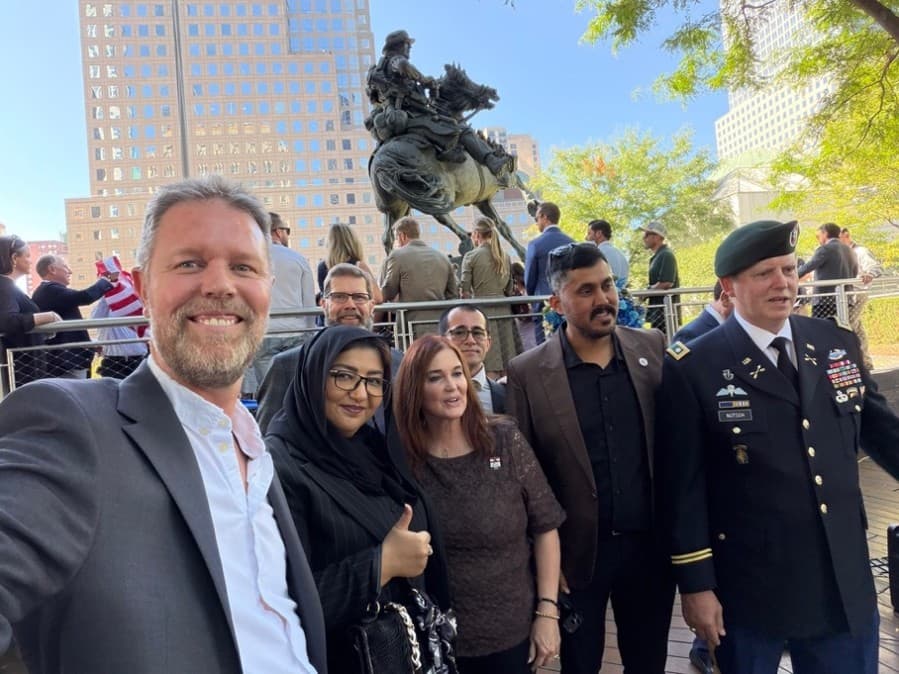 Williams (from left) with Rahila Dostum, Tiger 02 team member Vince Makela and behind him, Mark’s wife Amy Nutsch, two Uzbeks (whose names I am protecting) and Mark Nutsch at the “America’s Response” statue in NYC.