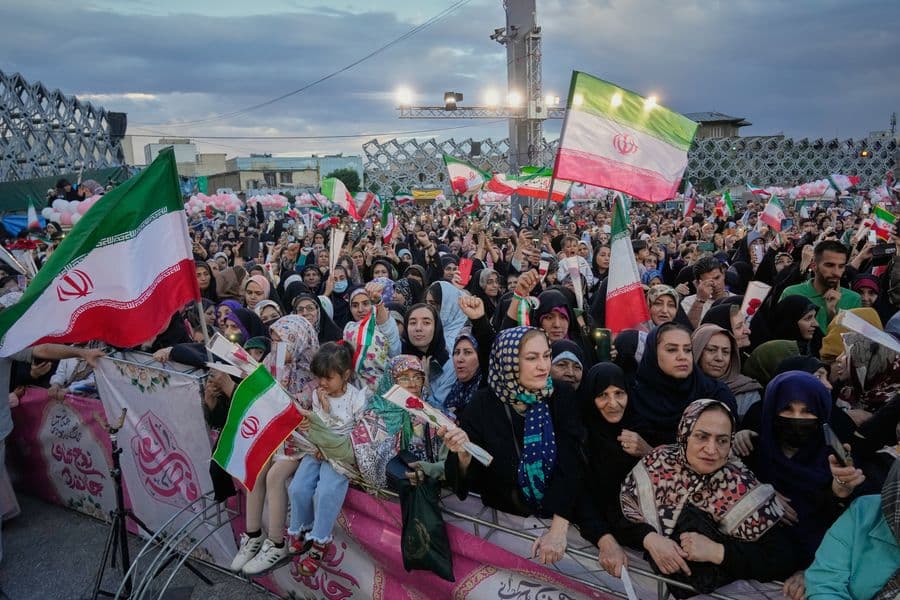 Photos of a mass wedding and a colorful missile at Tehran's 'Sacrifice for Iran' ceremony