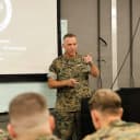 U.S. Marine Corps Lt. Gen. Eric E. Austin, the commanding general of Marine Corps Combat Development Command and deputy commandant for Combat Development and Integration, Portfolio Acquisition Executive, Marine Corps, provides his remarks at the Mavin Smart System Summit at Quantico Corporate Center, Va., Aug. 25, 2026. (U.S. Marine Corps photo by Lance Cpl. Magdalena Tochimani-Fuentes)