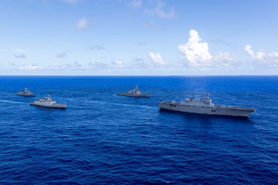 Japan Maritime Self-Defense Force Hyuga-class helicopter destroyer, JS Hyuga, leads United States Navy Arleigh Burke-class destroyer, USS Fitzgerald (centre-right), Indian Navy Shivalik-class frigate, INS Sahyadri (centre-left), and Royal Australian Navy Anzac-class frigate, HMAS Ballarat, during Exercise MALABAR 25 off the coast of Guam. (U.S. Navy)