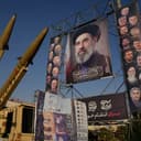 Iranian missiles and banners showing portraits of the Iranian Supreme Leader Ayatollah Mojtaba Khamenei, center, and the late armed forces commanders and nuclear scientists, who were killed in Israel and U.S. strikes, are displayed in a military exhibition commemorating the anniversary of the start of the 1980-88 Iraq-Iran war at Baharestan Square, in Tehran, Monday, Sept. 28, 2026. (AP Photo/Vahid Salemi)