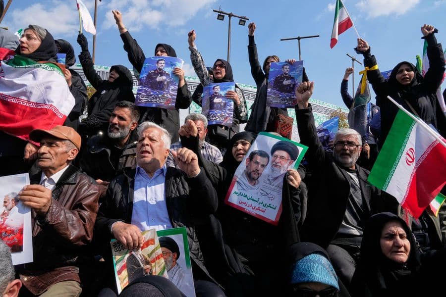 Mourners gather during a funeral procession for Alireza Tangsiri, head of Iran's Islamic Revolutionary Guard Corps Navy, and others killed in Israeli strikes in late March, in Tehran, Iran, Wednesday, April 1, 2026. (AP Photo/Vahid Salemi)