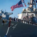 Sailors assigned to Arleigh Burke-class guided-missile destroyer USS McFaul (DDG-74) man the rails at the warship’s homecoming at Naval Station Norfolk, Va., on Oct. 23, 2026. (U.S. Navy)